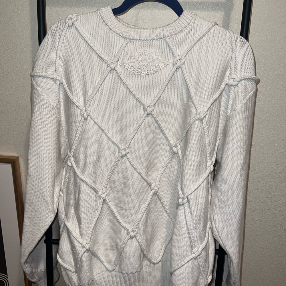 White Sweater with Knotted Design